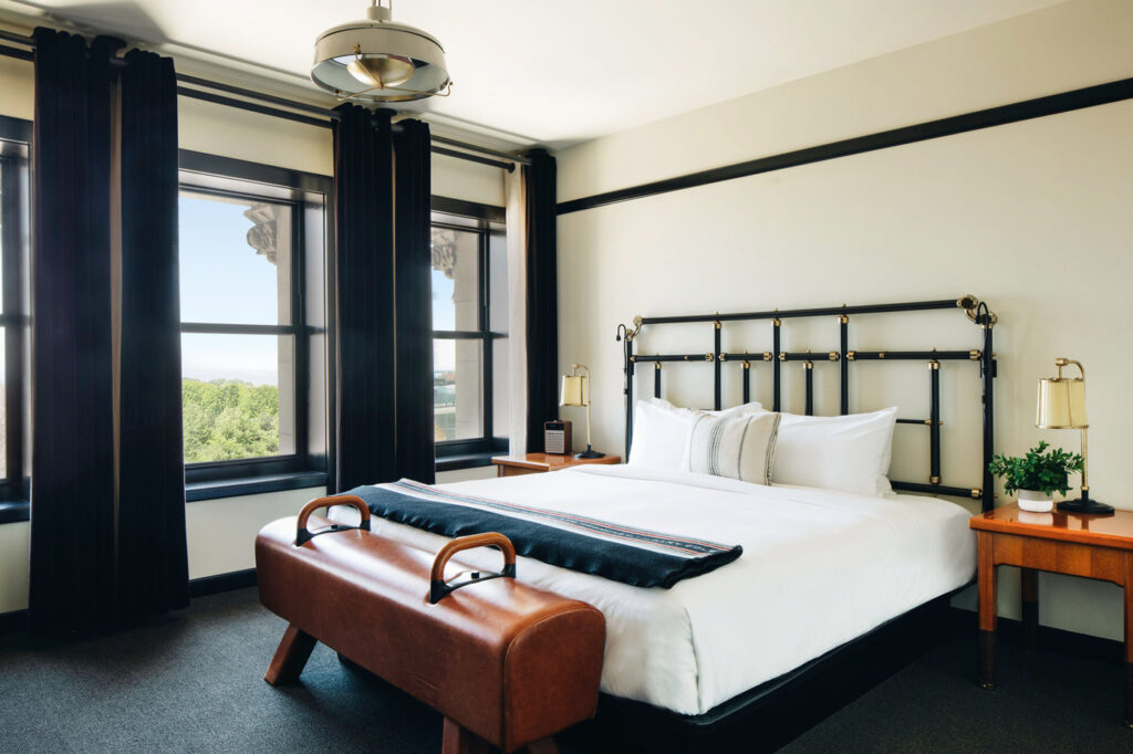 A room with a single bed at the Chicago Athletic Association